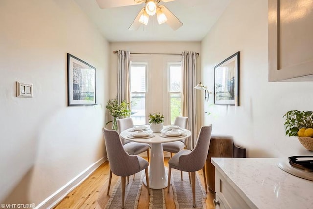 4240 N Clarendon Ave Unit 301S, Chicago, IL 60613 - dining space with baseboards, light wood-style flooring, and ceiling fan