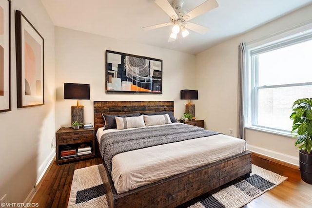 4240 N Clarendon Ave Unit 301S, Chicago, IL 60613 - bedroom featuring wood finished floors, multiple windows, and baseboards