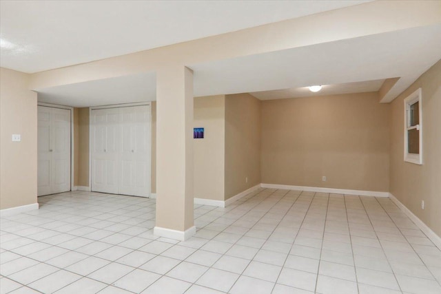 2 Reading Rd, Bloomington, IL 61701 - finished below grade area featuring light tile patterned flooring and baseboards