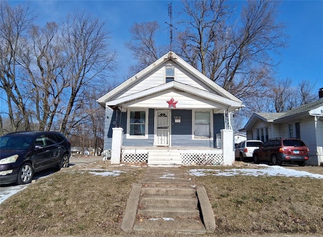 1702 E Locust St, Decatur, IL 62521 - view of front of house featuring covered porch