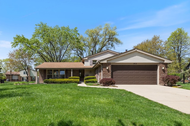 view of front of home with an attached garage, brick siding, and concrete driveway