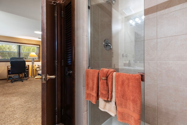 bathroom featuring a stall shower
