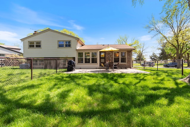 back of property featuring a patio area and brick siding