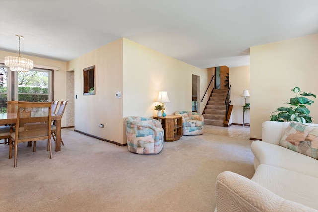 living area featuring stairs, a chandelier, baseboards, and light carpet