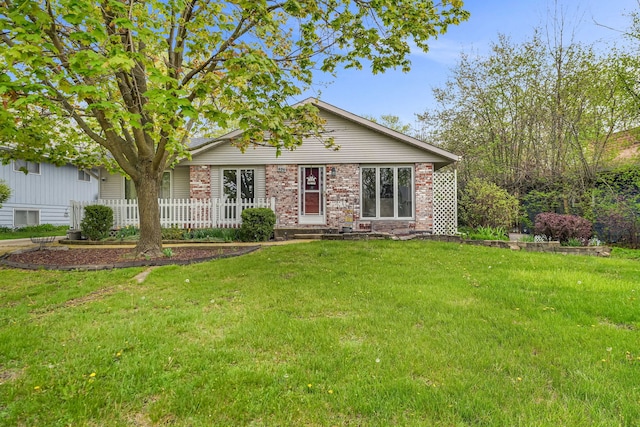 view of front of house with brick siding