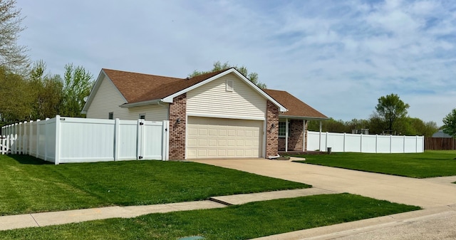 view of front of home with a garage, fence, a front yard, brick siding, and concrete driveway