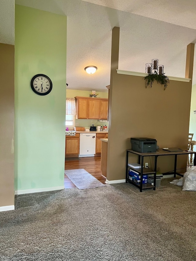living room with a textured ceiling, baseboards, and dark carpet