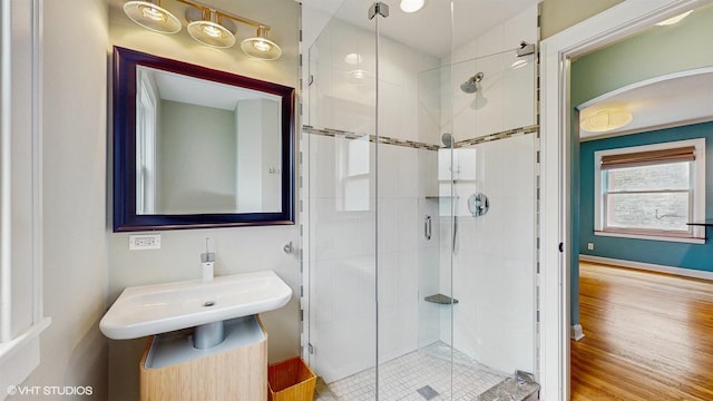 1730 Madison St, Evanston, IL 60202 - full bathroom featuring a shower stall, baseboards, and wood finished floors