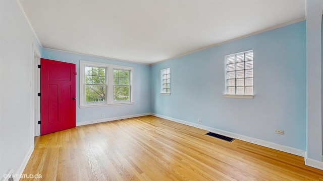 1730 Madison St, Evanston, IL 60202 - unfurnished room featuring wood finished floors, crown molding, and baseboards