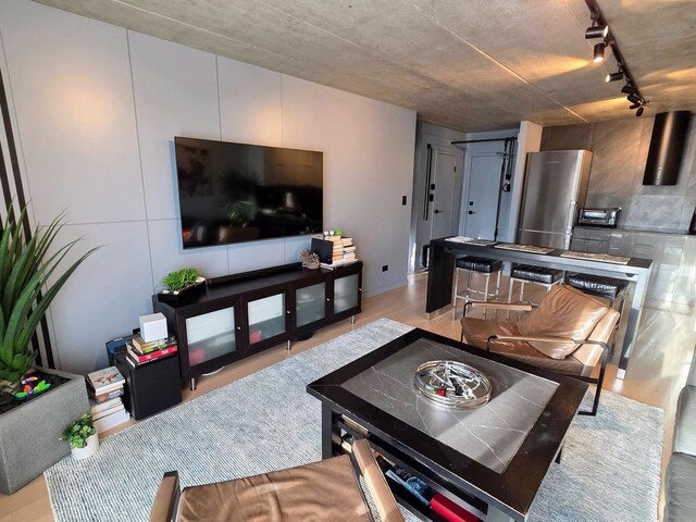 9701 N Dee Rd Unit 2G, Niles, IL 60714 - living area with rail lighting