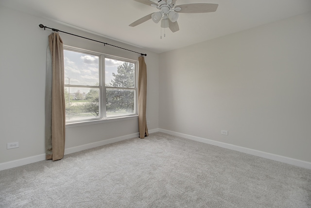 1877 Westmore Grove Dr, Plainfield, IL 60586 - empty room with carpet flooring, a ceiling fan, and baseboards
