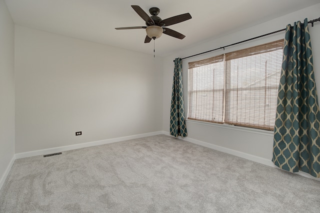 1877 Westmore Grove Dr, Plainfield, IL 60586 - unfurnished room featuring carpet flooring, baseboards, and a ceiling fan
