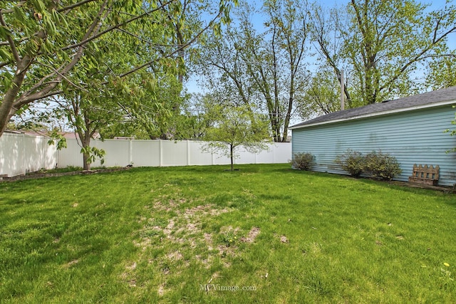 view of yard with fence
