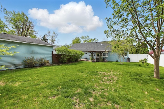 view of yard with fence