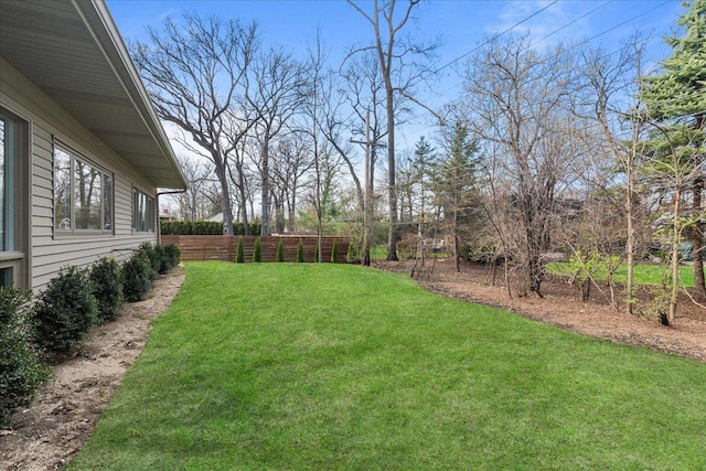 view of yard with fence