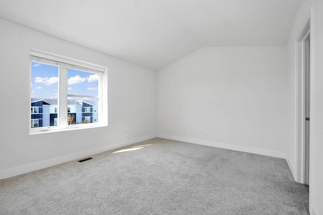 4133 Calder Ln, Aurora, IL 60504 - interior space with visible vents, baseboards, carpet, and lofted ceiling