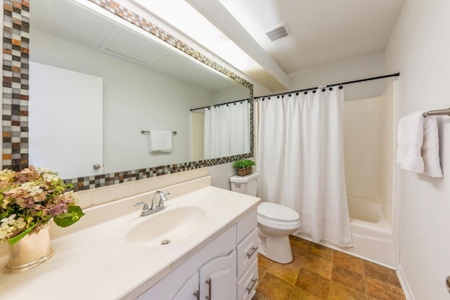 full bathroom featuring stone finish floor, visible vents, shower / tub combo, vanity, and toilet