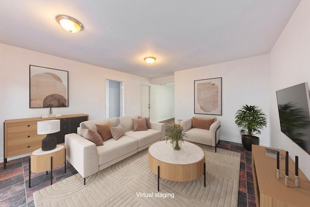 living room featuring baseboards