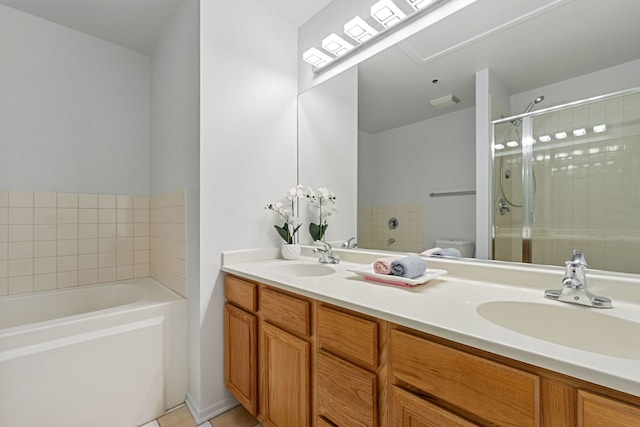 1530 S State St Unit 523, Chicago, IL 60605 - bathroom featuring a sink, tile patterned floors, a shower stall, and toilet