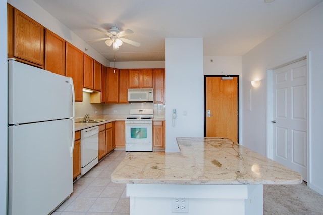 9355 Irving Park Rd Unit 510, Schiller Park, IL 60176 - kitchen featuring backsplash, a ceiling fan, a center island, a sink, and white appliances