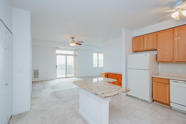 9355 Irving Park Rd Unit 510, Schiller Park, IL 60176 - kitchen featuring light countertops, a ceiling fan, white appliances, and visible vents