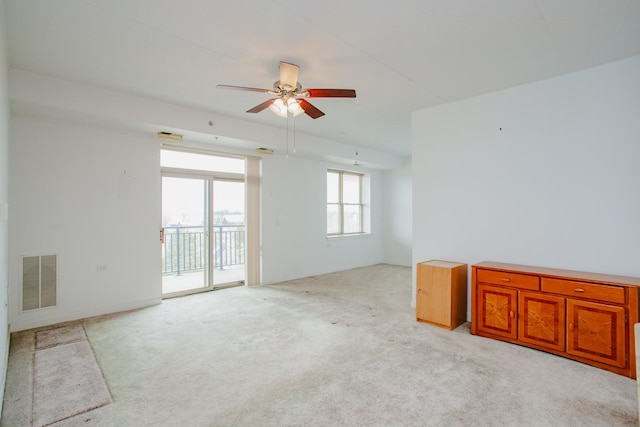 9355 Irving Park Rd Unit 510, Schiller Park, IL 60176 - spare room with light carpet, a ceiling fan, and visible vents