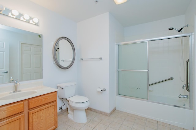 9355 Irving Park Rd Unit 510, Schiller Park, IL 60176 - bathroom featuring toilet, enclosed tub / shower combo, tile patterned flooring, and vanity
