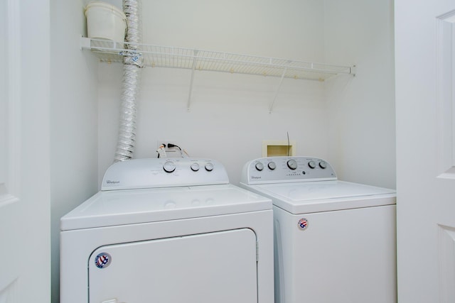 9355 Irving Park Rd Unit 510, Schiller Park, IL 60176 - clothes washing area featuring laundry area and washer and clothes dryer
