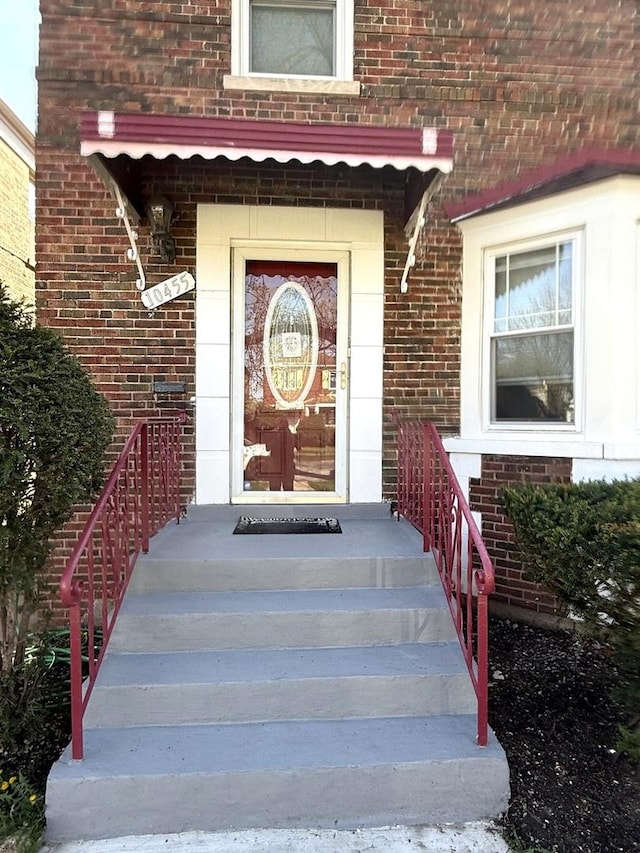 10455 S Forest Ave, Chicago, IL 60628 - doorway to property with brick siding