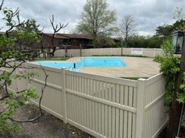 55 W 64th St Unit 202, Westmont, IL 60559 - community pool with a patio and fence