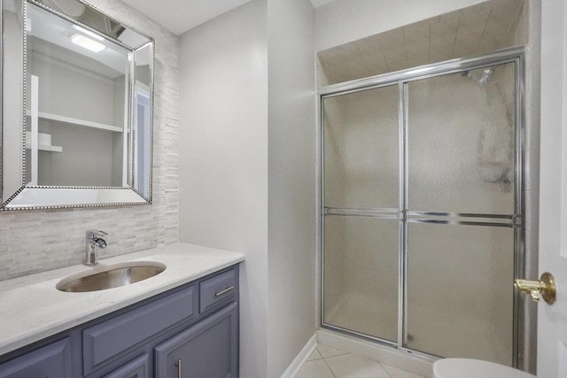 1872 River Ridge Circle, Naperville, IL 60565 - bathroom featuring vanity, backsplash, a stall shower, tile patterned floors, and toilet
