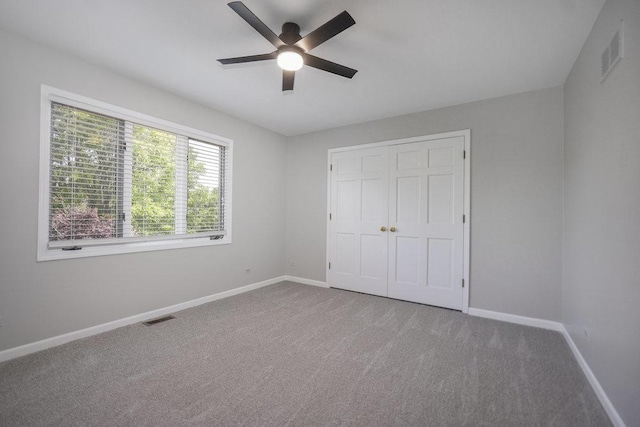 1872 River Ridge Circle, Naperville, IL 60565 - unfurnished bedroom with baseboards, carpet flooring, a closet, and ceiling fan