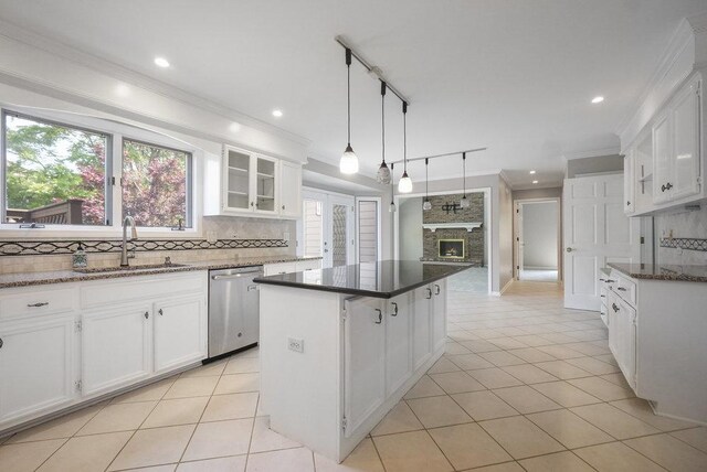 1872 River Ridge Circle, Naperville, IL 60565 - kitchen featuring dishwasher, a sink, crown molding, decorative backsplash, and a kitchen island