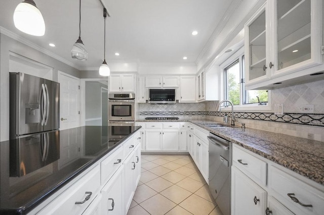 1872 River Ridge Circle, Naperville, IL 60565 - kitchen with appliances with stainless steel finishes, light tile patterned floors, white cabinetry, dark stone countertops, and a sink