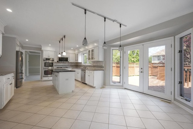 1872 River Ridge Circle, Naperville, IL 60565 - kitchen featuring appliances with stainless steel finishes, crown molding, a sink, backsplash, and french doors