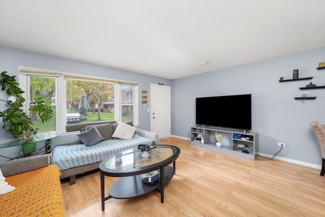 165 Dover Dr Unit 3, Des Plaines, IL 60018 - living room with baseboards and light wood-style flooring