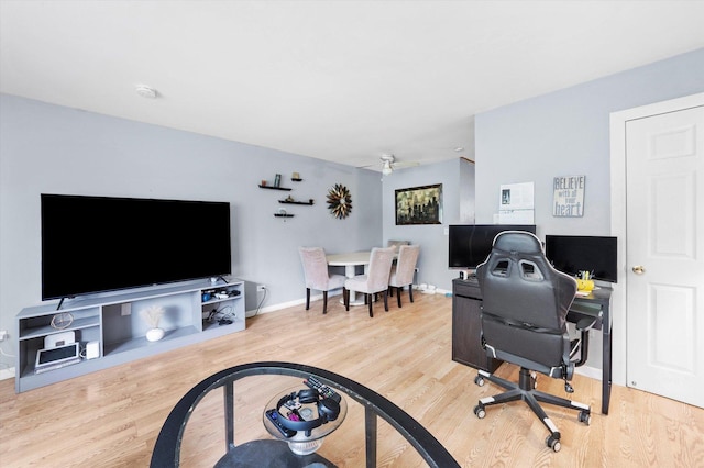 165 Dover Dr Unit 3, Des Plaines, IL 60018 - home office with baseboards, ceiling fan, and wood finished floors