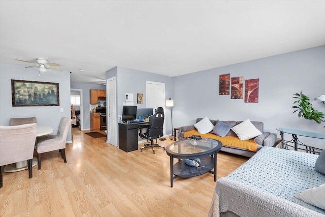 165 Dover Dr Unit 3, Des Plaines, IL 60018 - living area with a ceiling fan and light wood-style floors