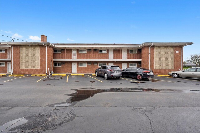165 Dover Dr Unit 3, Des Plaines, IL 60018 - view of property with uncovered parking