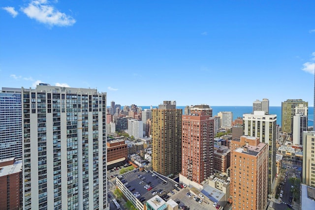 property's view of city with a water view