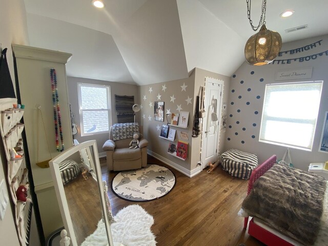 bedroom with recessed lighting, baseboards, wood finished floors, lofted ceiling, and visible vents