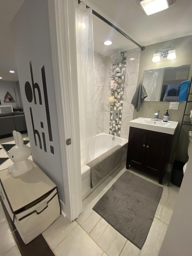 full bath with shower / bathtub combination, vanity, and recessed lighting