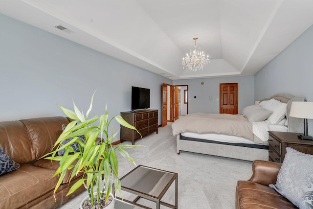 carpeted bedroom featuring a notable chandelier, visible vents, lofted ceiling, and a raised ceiling