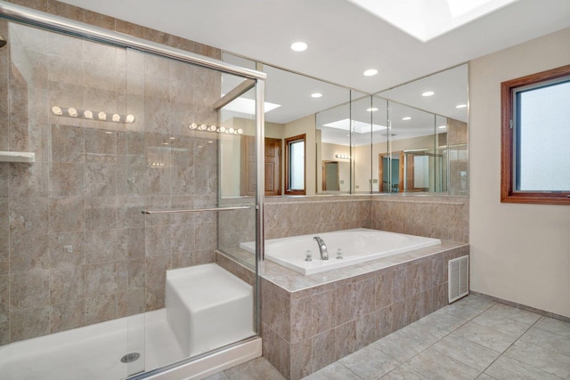 full bath featuring tile patterned flooring, recessed lighting, visible vents, a garden tub, and a stall shower