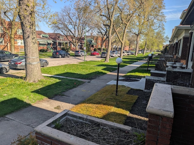 7549 S Perry Ave, Chicago, IL 60620 - surrounding community with a residential view and a yard