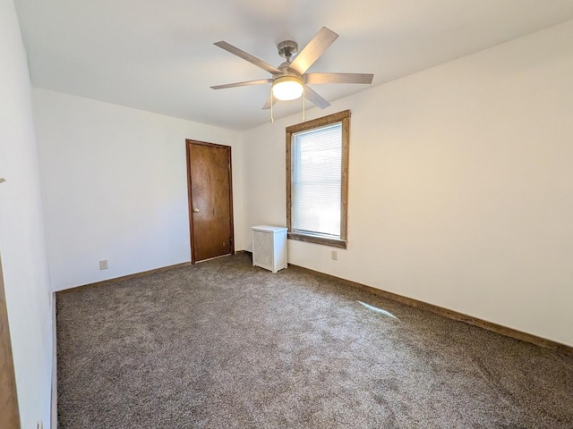 7549 S Perry Ave, Chicago, IL 60620 - spare room with carpet floors, baseboards, and a ceiling fan