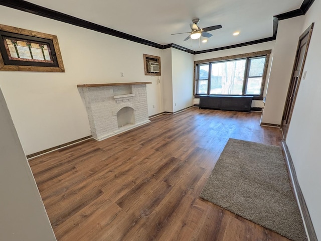 7549 S Perry Ave, Chicago, IL 60620 - unfurnished living room with ornamental molding, a brick fireplace, wood finished floors, baseboards, and a ceiling fan
