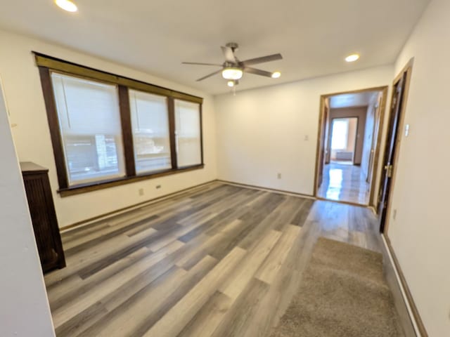 7549 S Perry Ave, Chicago, IL 60620 - unfurnished room with recessed lighting, baseboards, ceiling fan, and wood finished floors