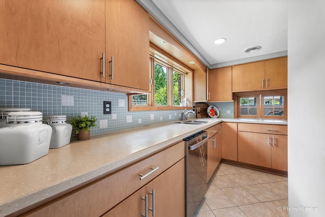 622 Katherine St, Saint Charles, IL 60174 - kitchen with stainless steel dishwasher, light tile patterned flooring, light countertops, and tasteful backsplash