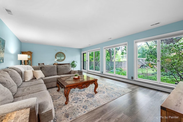 622 Katherine St, Saint Charles, IL 60174 - living room with a baseboard heating unit and wood finished floors